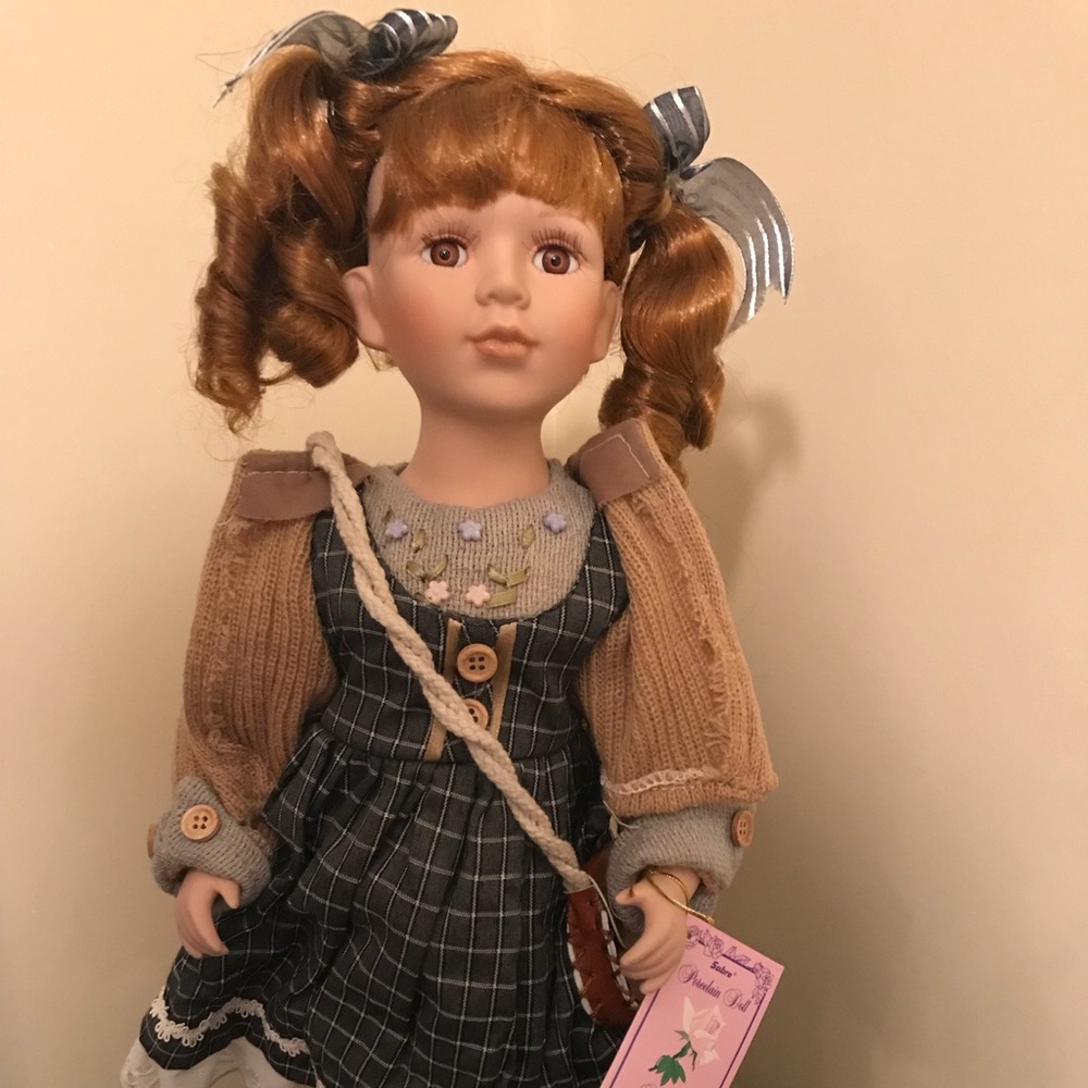 Redheaded porcelain doll